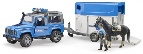 Set de joaca Masina de politie Land Rover Defender cu remorca, politist si cal Bruder
