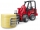 Set de joaca Incarcator compact Schaffer 2630 cu grafier si un balot rotund Bruder