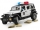 Jucarie Jeep Wrangler Unlimited Rubicon de politie cu sirena si figurina Bruder 